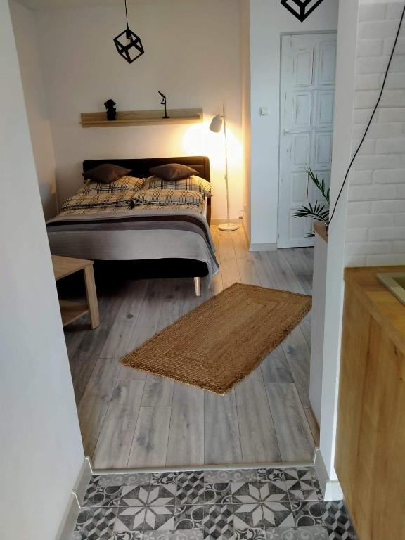 Ένα ή περισσότερα κρεβάτια σε δωμάτιο στο Pokój u Katarzyny