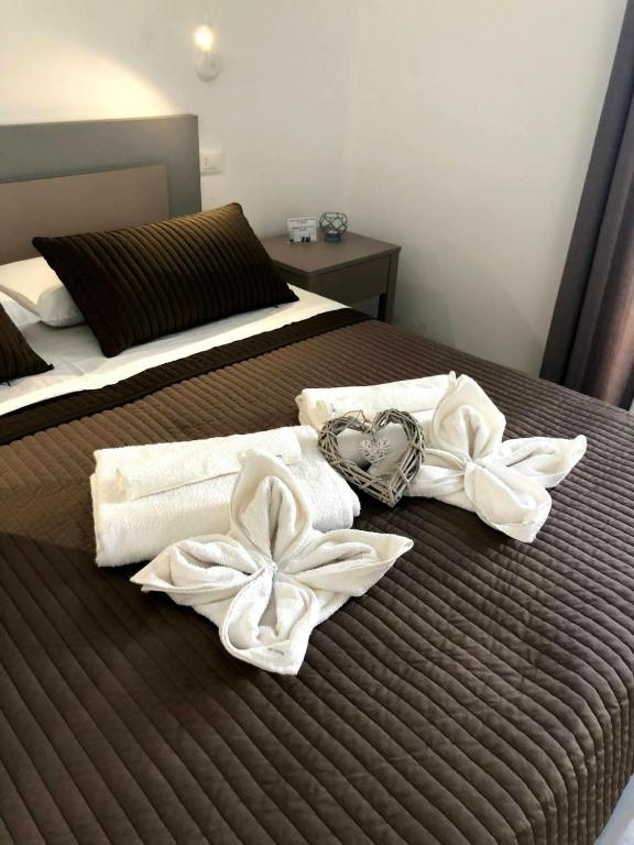 Postel nebo postele na pokoji v ubytování Radici Mare B&B