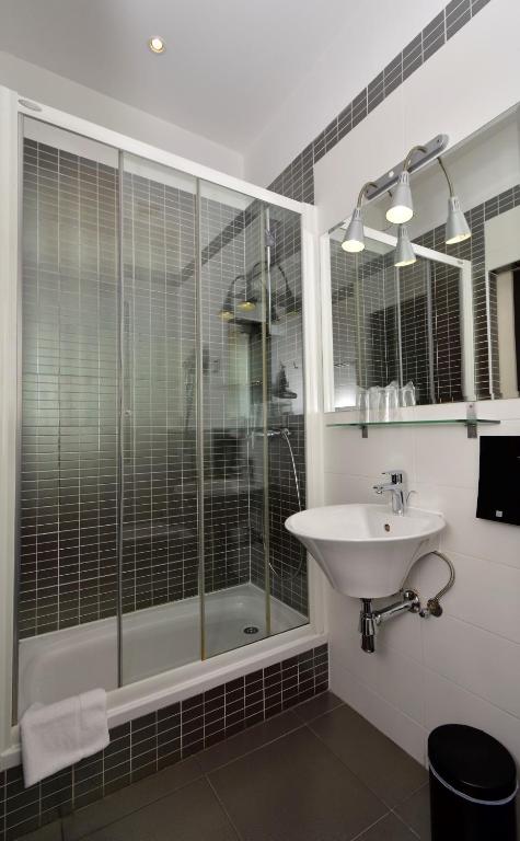 Koupelna v ubytování Marmontova Luxury Rooms
