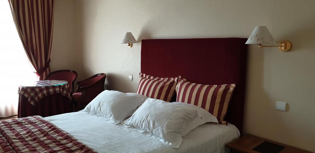 Postel nebo postele na pokoji v ubytování Hotel Argi Eder