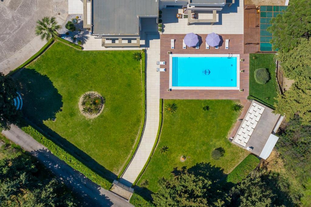 Bazén v ubytování Bella Foresta Villa nebo v jeho okolí