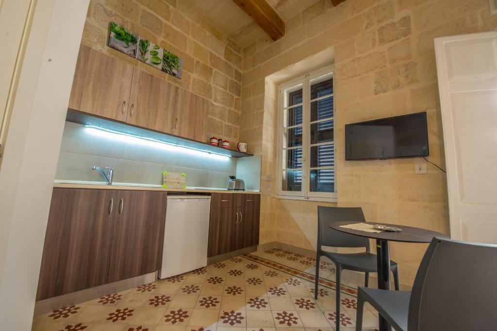 Kuchyň nebo kuchyňský kout v ubytování Casa Lapira