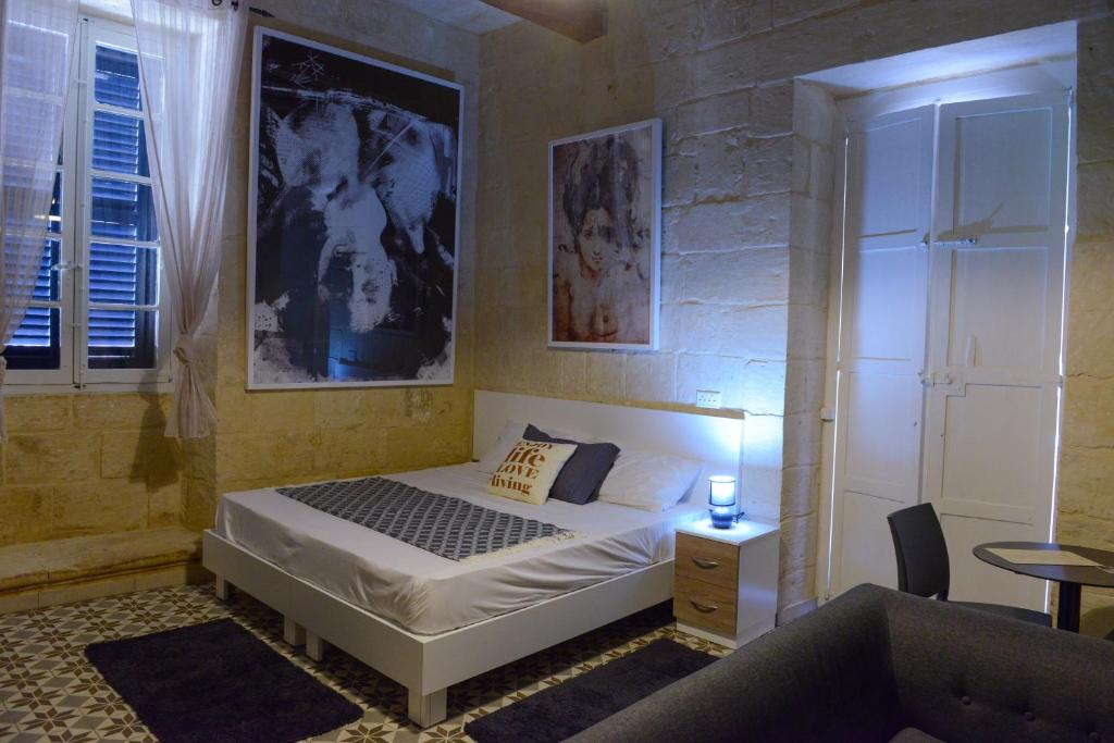 Postel nebo postele na pokoji v ubytování Casa Lapira