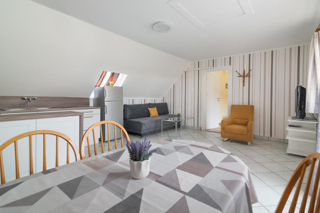 Posezení v ubytování Nemes Apartmanház