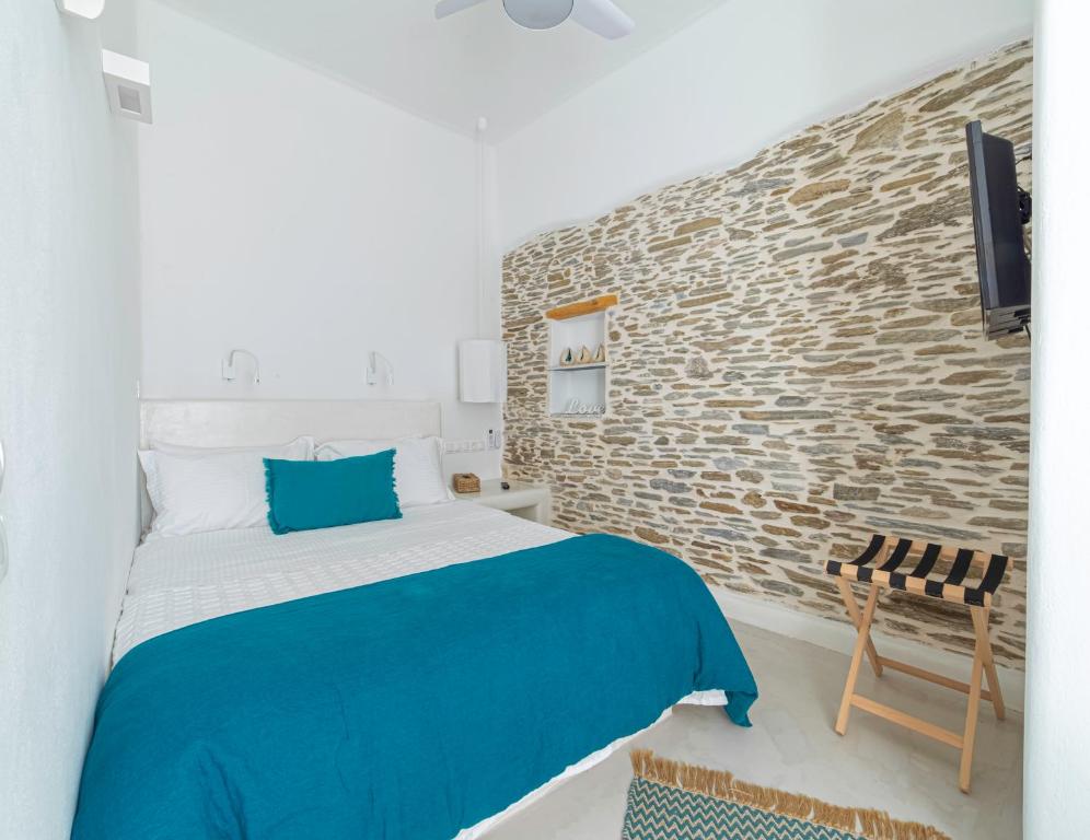 A bed or beds in a room at Lasia Boutique Apartment