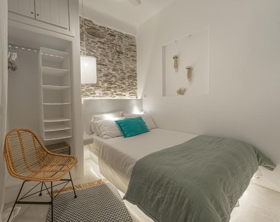 A bed or beds in a room at Lasia Boutique Apartment