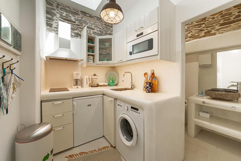A kitchen or kitchenette at Lasia Boutique Apartment