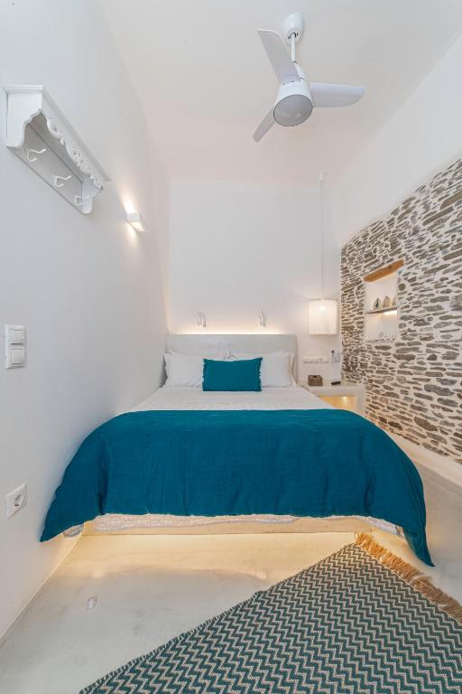 A bed or beds in a room at Lasia Boutique Apartment