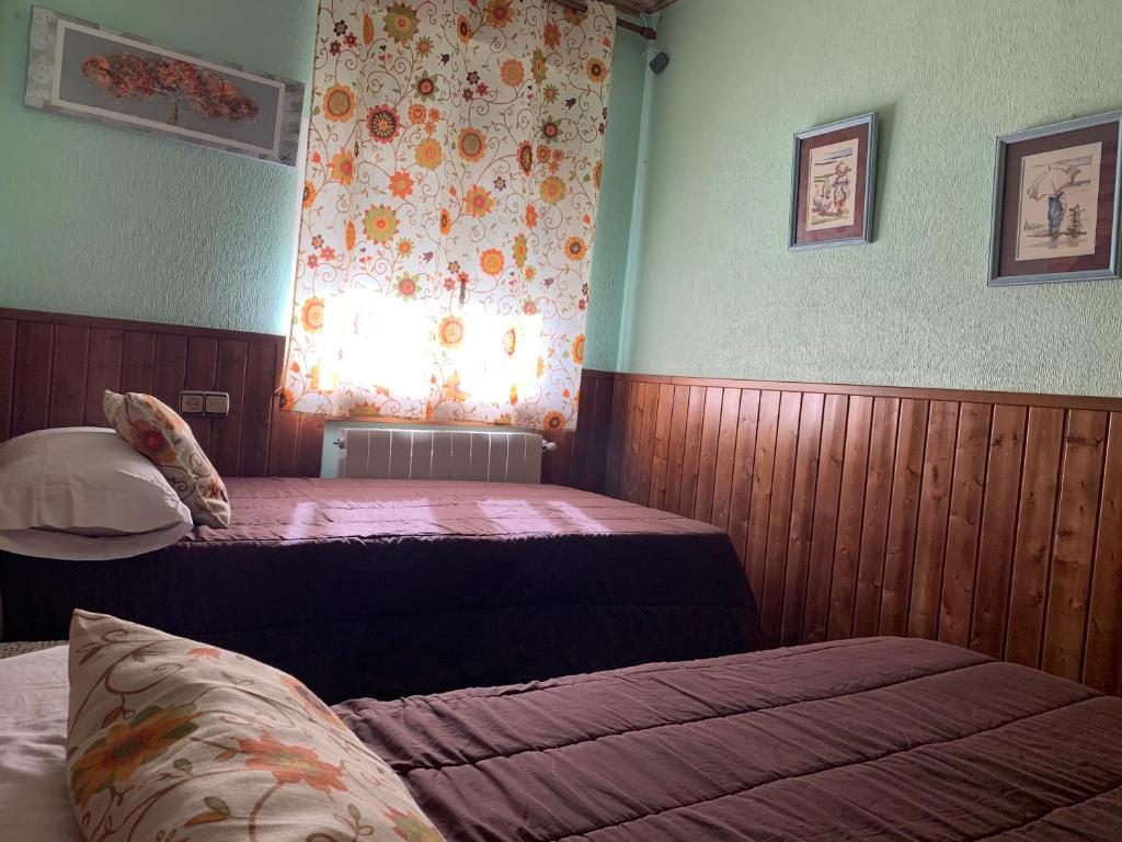 Posteľ alebo postele v izbe v ubytovaní Apartamento rural FRAGARIA
