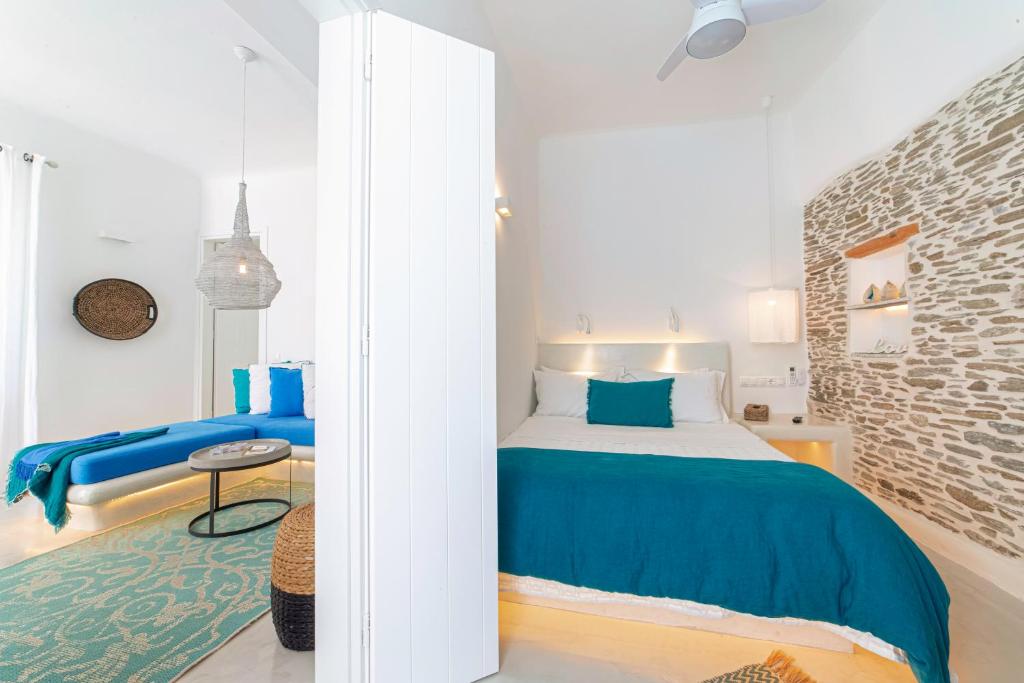 A bed or beds in a room at Lasia Boutique Apartment