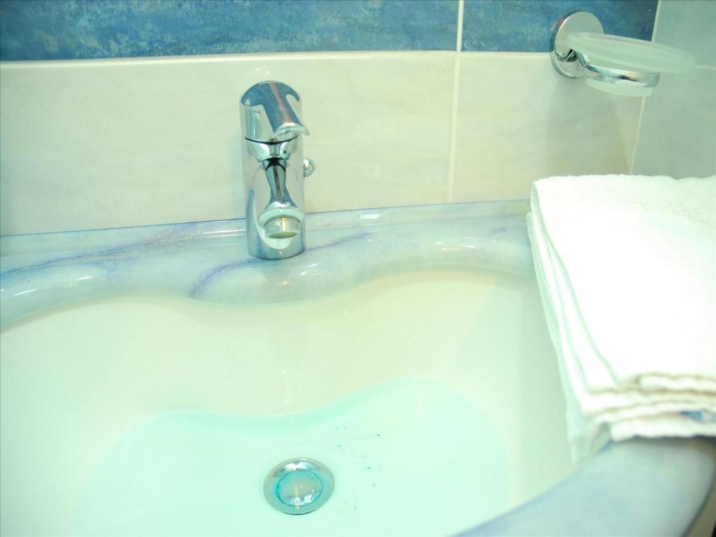 Koupelna v ubytování Hotel Veliero