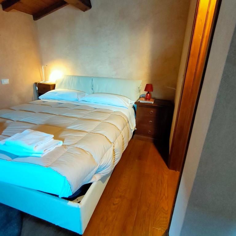 Postel nebo postele na pokoji v ubytování IL BORGO DI ROCCA CALASCIO