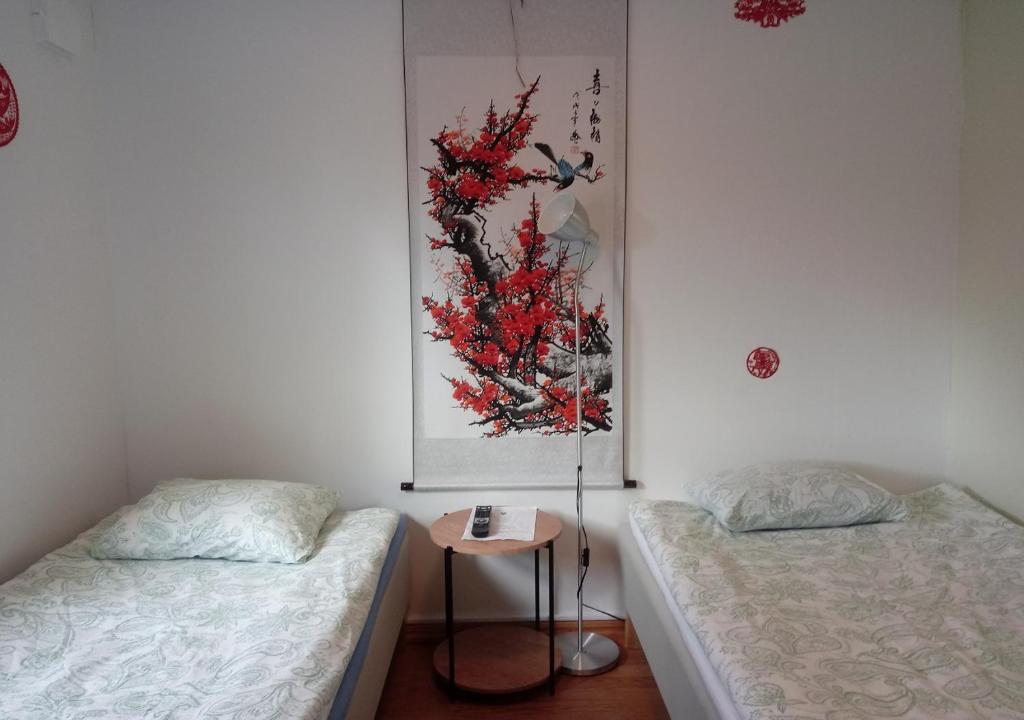 Postel nebo postele na pokoji v ubytování Lin's B&B
