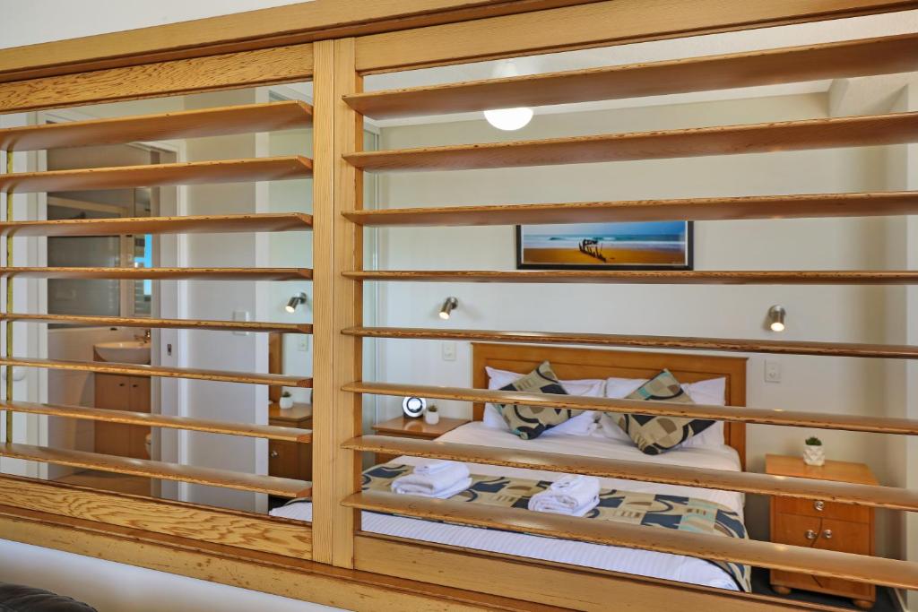 Postel nebo postele na pokoji v ubytování Ocean Boulevard