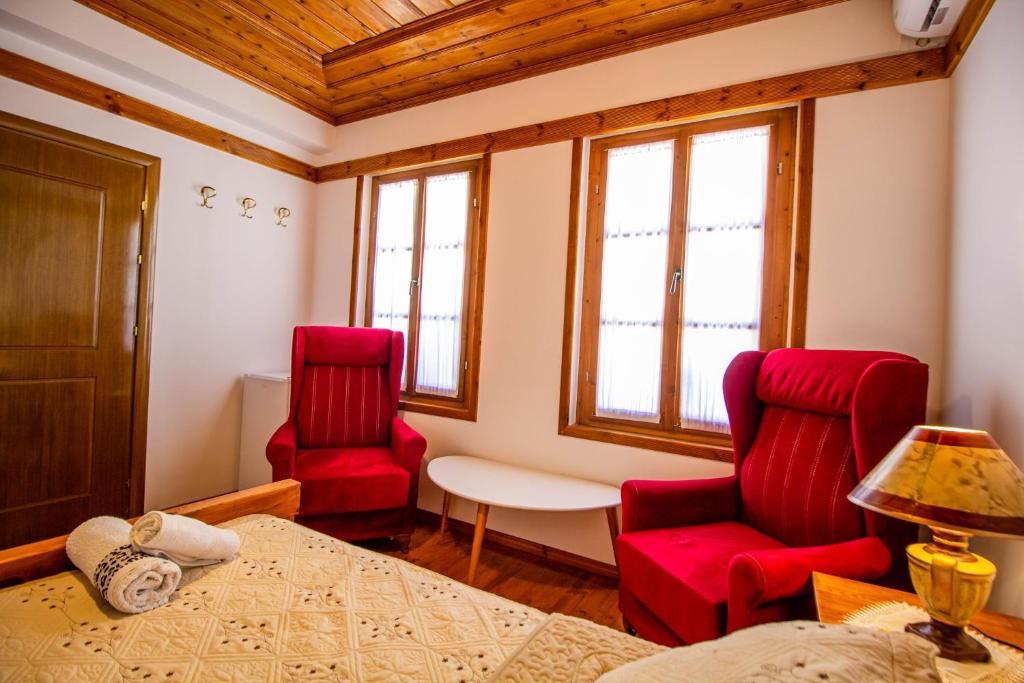 Uma área de estar em Hotel Bebej Tradicional