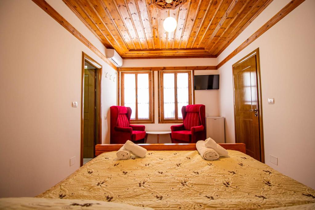 Uma área de estar em Hotel Bebej Tradicional