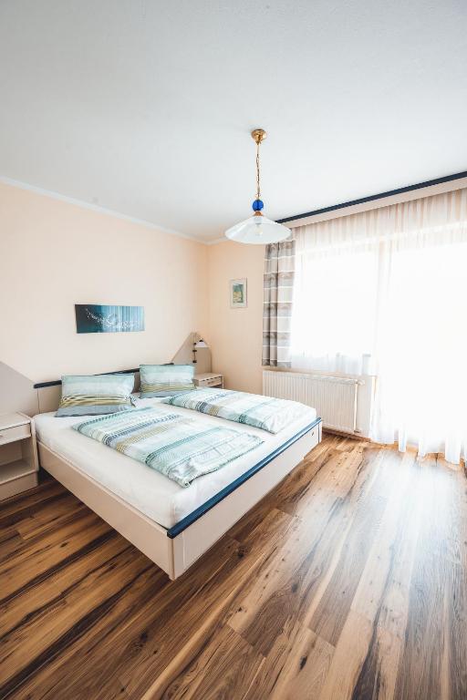 Postel nebo postele na pokoji v ubytování Ferienhaus Ramsbacher