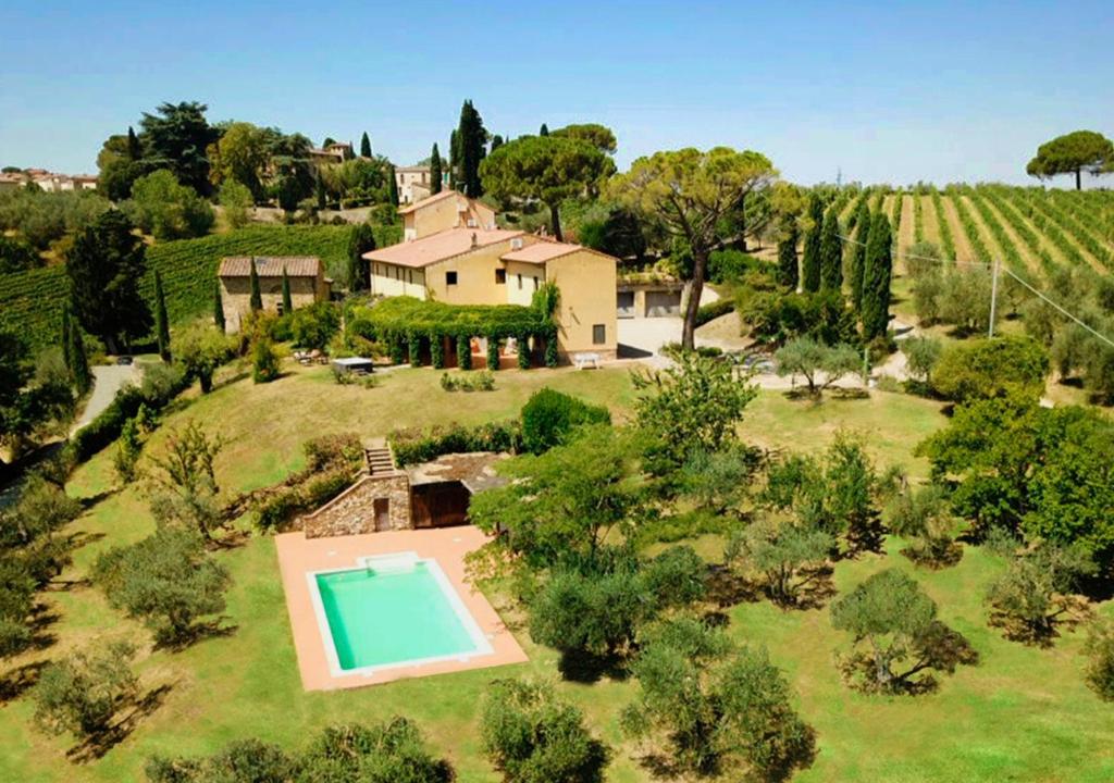 an aerial view of a estate with a swimming pool at Tenuta Massabò in San Casciano in Val di Pesa