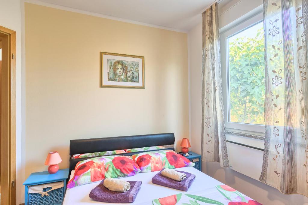 Postel nebo postele na pokoji v ubytování Holiday house Daniela