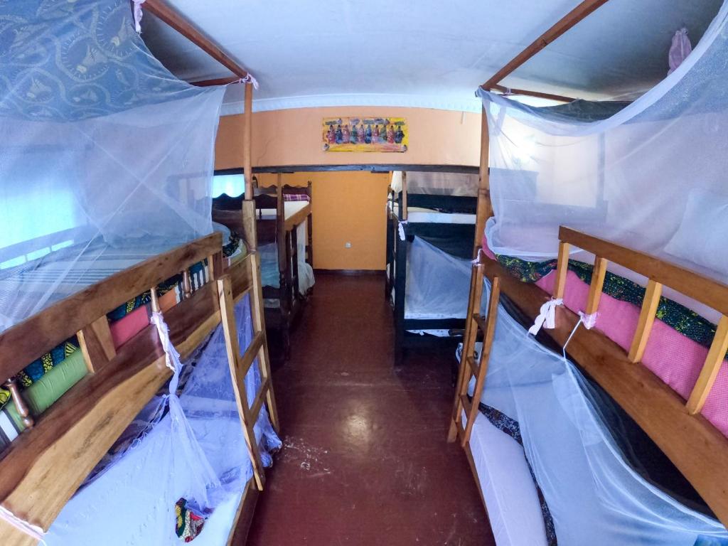 Postel nebo postele na pokoji v ubytování First Point Arusha Hostel