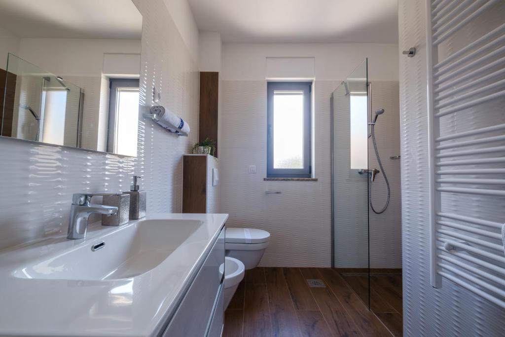 Kúpeľňa v ubytovaní Apartments Luana with private jacuzzi