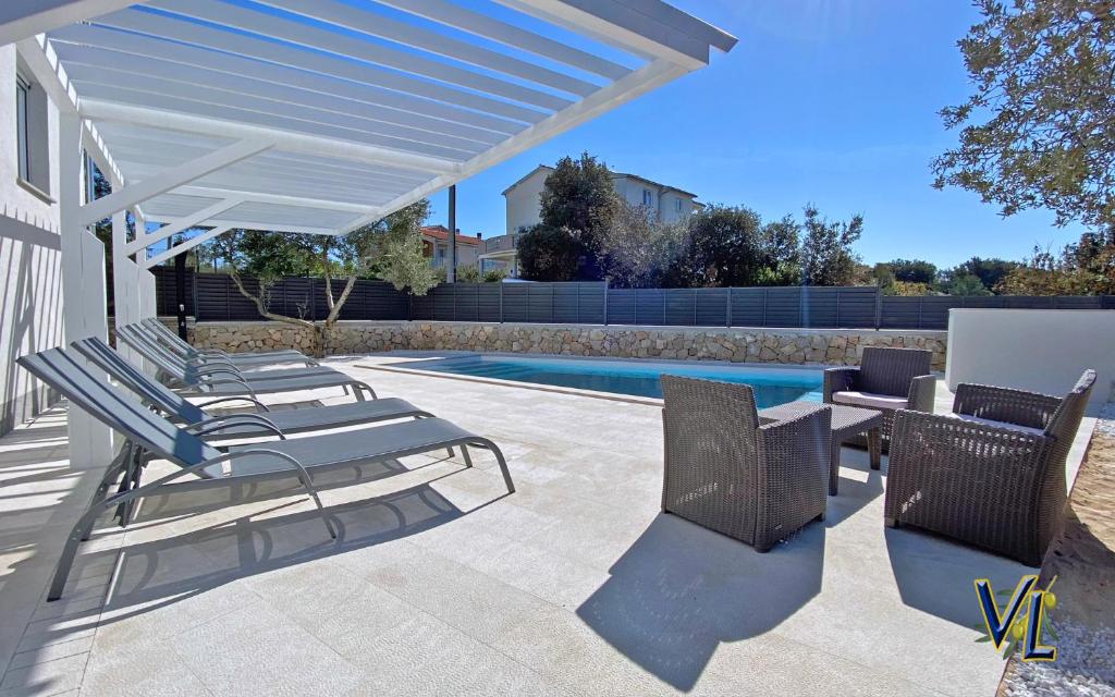 Zdjęcie z galerii obiektu Pakostane - MASLENIK -appartement 65 m2 et piscine w Pakoštane