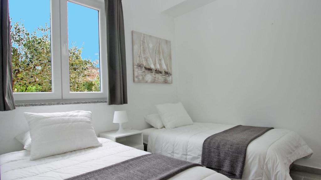 Zdjęcie z galerii obiektu Pakostane - MASLENIK -appartement 65 m2 et piscine w Pakoštane