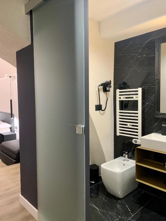 Koupelna v ubytování Toledo Boutique Rooms