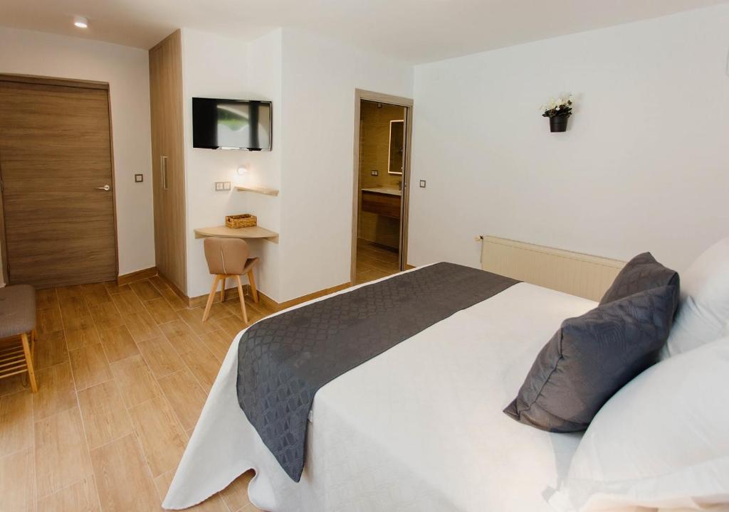 Postel nebo postele na pokoji v ubytování Casa Felizia