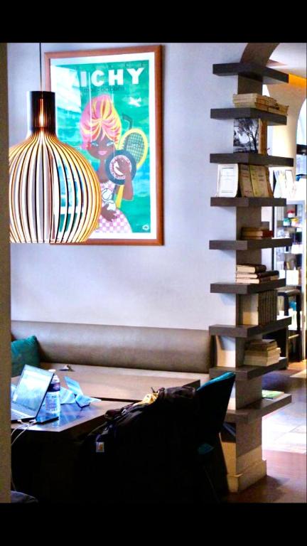 Posezení v ubytování Kyriad Restaurant Centre SPA Vichy