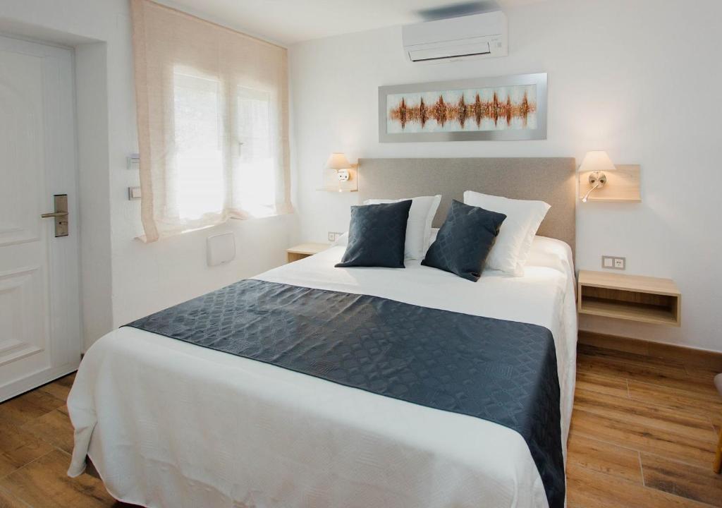 Postel nebo postele na pokoji v ubytování Casa Felizia
