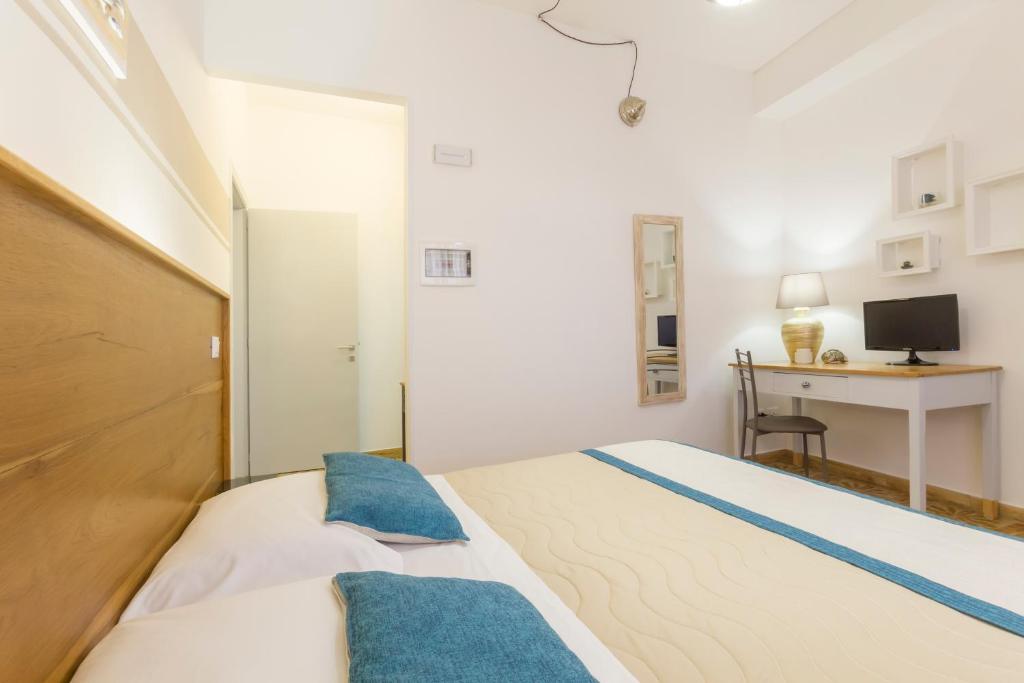 TV a/nebo společenská místnost v ubytování B&B Villa Ginevra