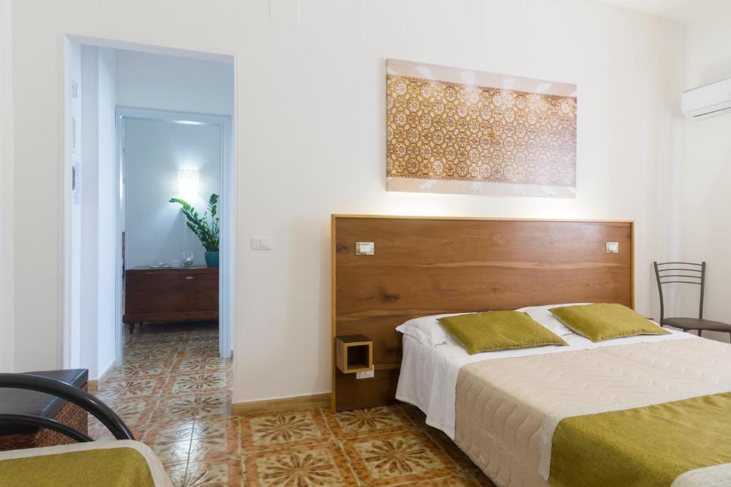 Postel nebo postele na pokoji v ubytování B&B Villa Ginevra