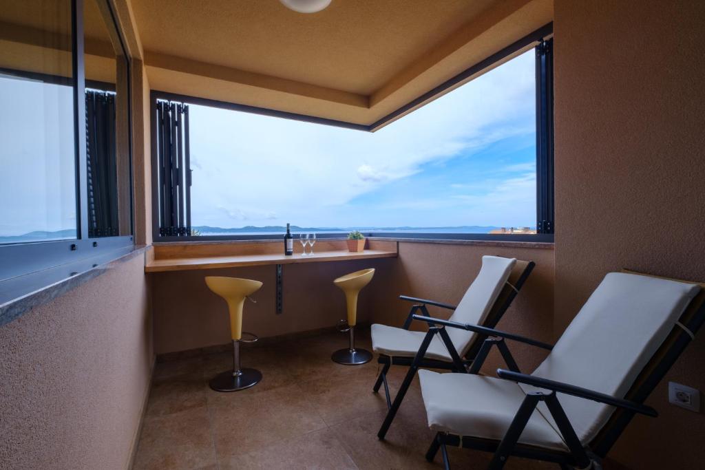 Posedenie v ubytovaní Apartments Luana with private jacuzzi