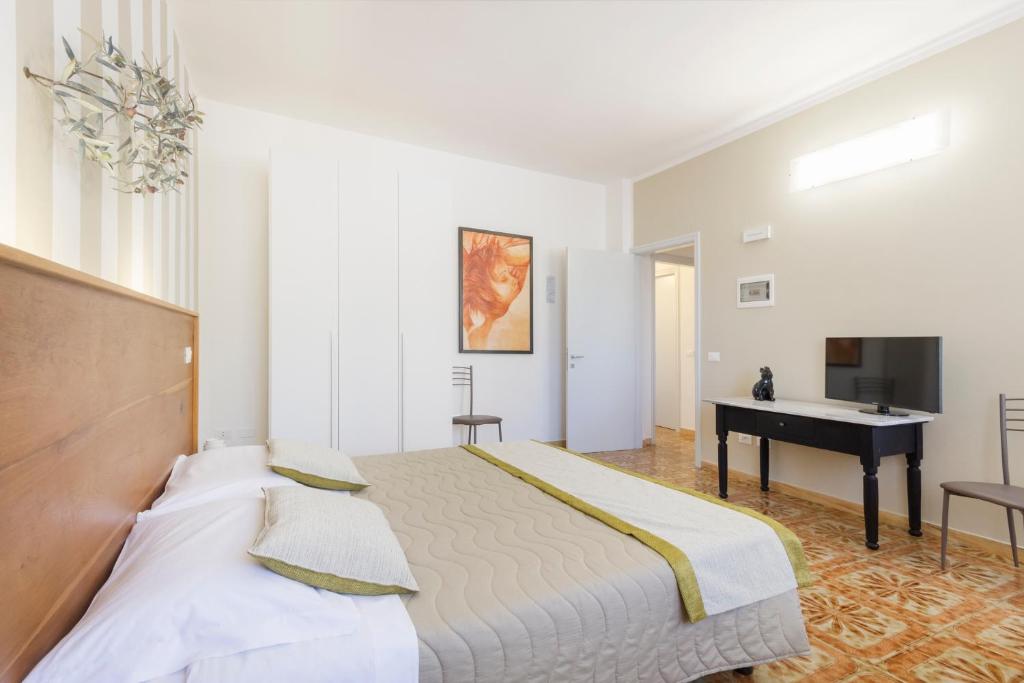 Postel nebo postele na pokoji v ubytování B&B Villa Ginevra