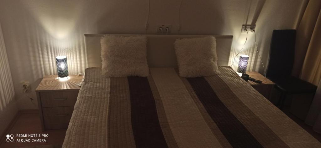 Posteľ alebo postele v izbe v ubytovaní Sunshine 208 apartman