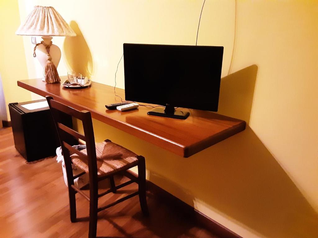 TV a/nebo společenská místnost v ubytování B&B Sa Costera