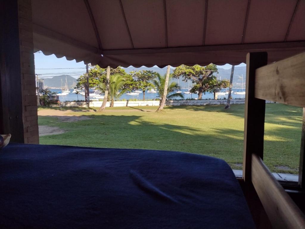  ALOHA em frente a praia- Suítes privativas & hostel