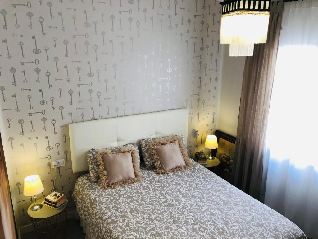 Posteľ alebo postele v izbe v ubytovaní Apartamento a 50 metros de la playa malagueta con vistas al mar