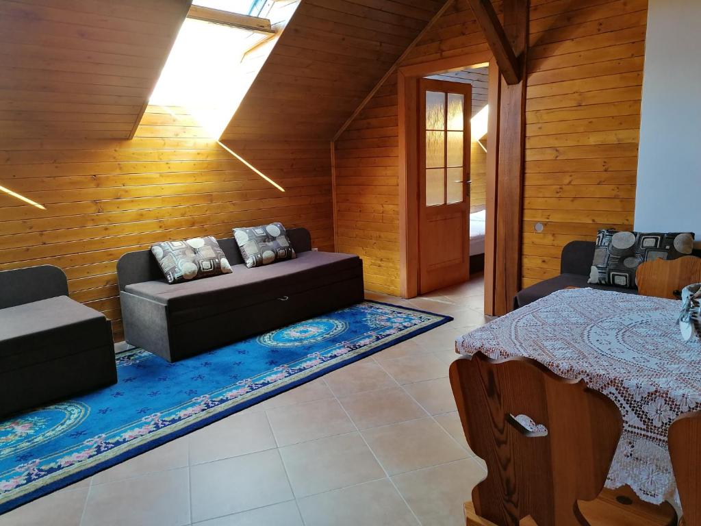 Postel nebo postele na pokoji v ubytování Jonášův Mlýn