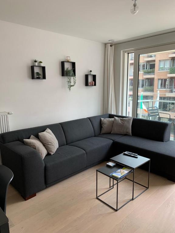 Ruang duduk di Nieuwbouwappartement Lippenslaan, 2 -Slaapkamers