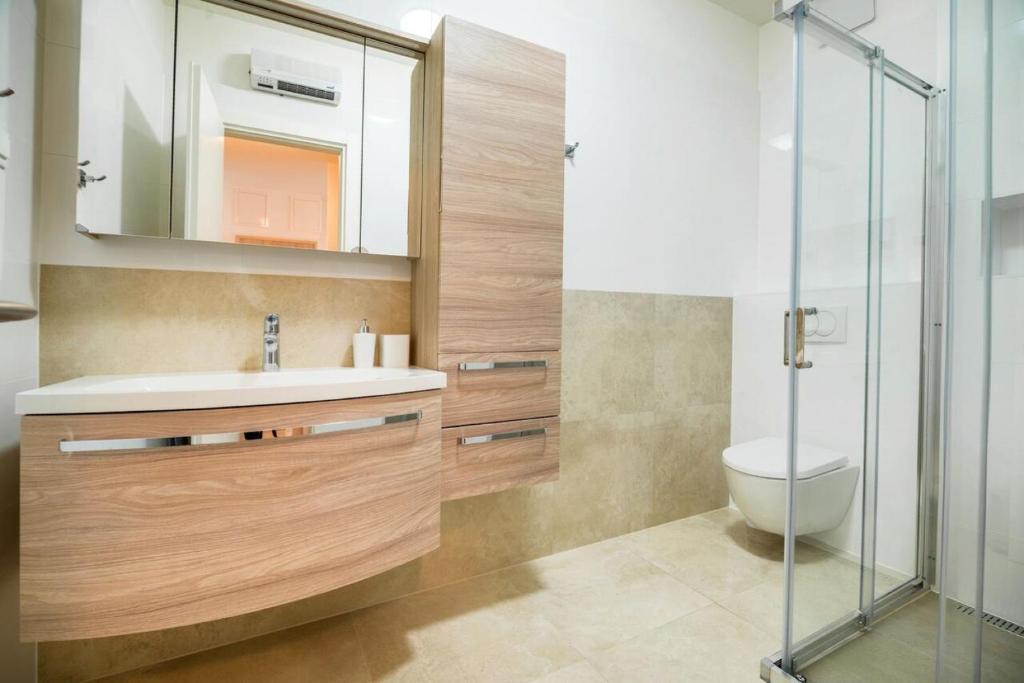 Kúpeľňa v ubytovaní Sea view apartment Ema