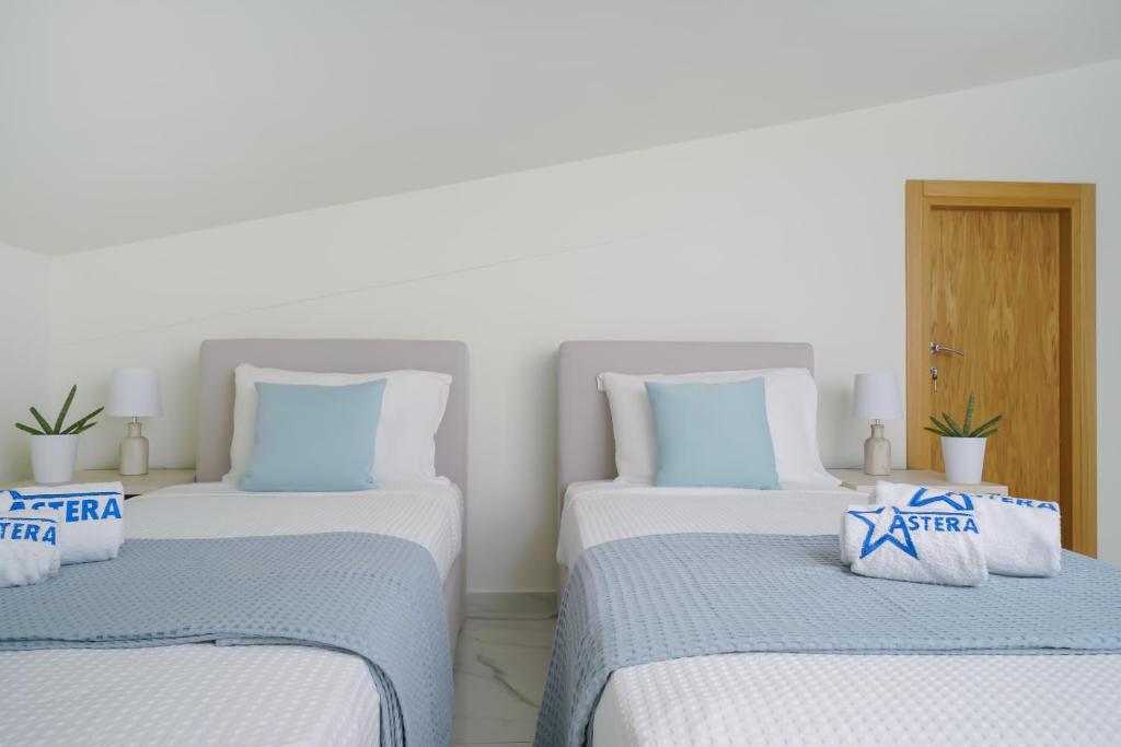 Postel nebo postele na pokoji v ubytování Hotel ASTERA