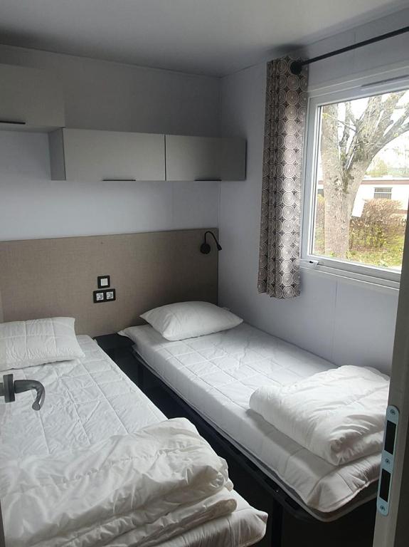 Postel nebo postele na pokoji v ubytování Camping Panorama