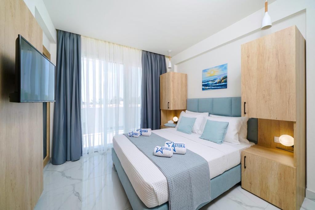 Postel nebo postele na pokoji v ubytování Hotel ASTERA