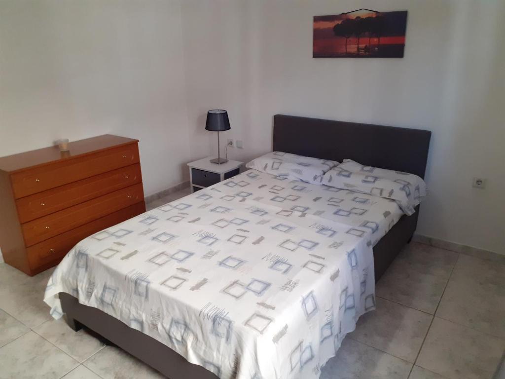 Łóżko lub łóżka w pokoju w obiekcie Asteris appartment