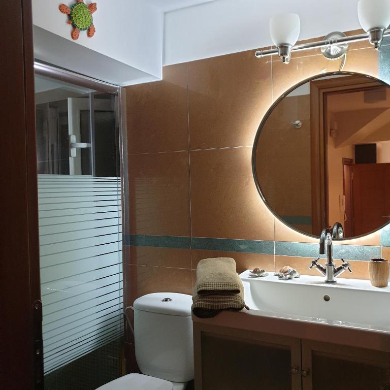 Koupelna v ubytování cozy apartment nafpaktos