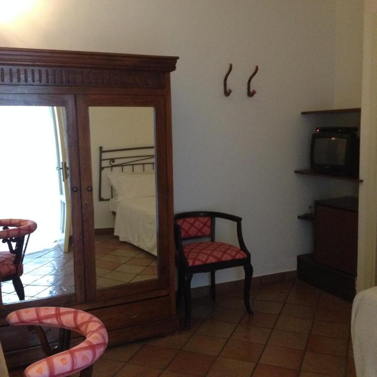 TV a/nebo společenská místnost v ubytování Albergo Boutique Casajanca