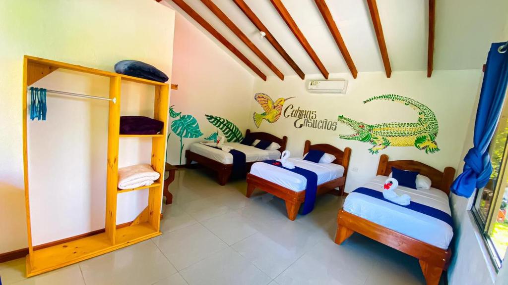 Postel nebo postele na pokoji v ubytování Cabinas ensueños