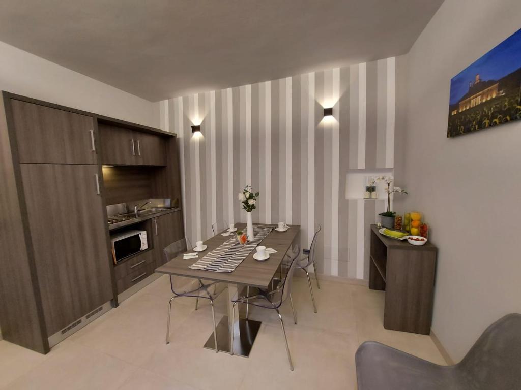 Kuchyňa alebo kuchynka v ubytovaní Casa Vacanze Piccolpasso 20